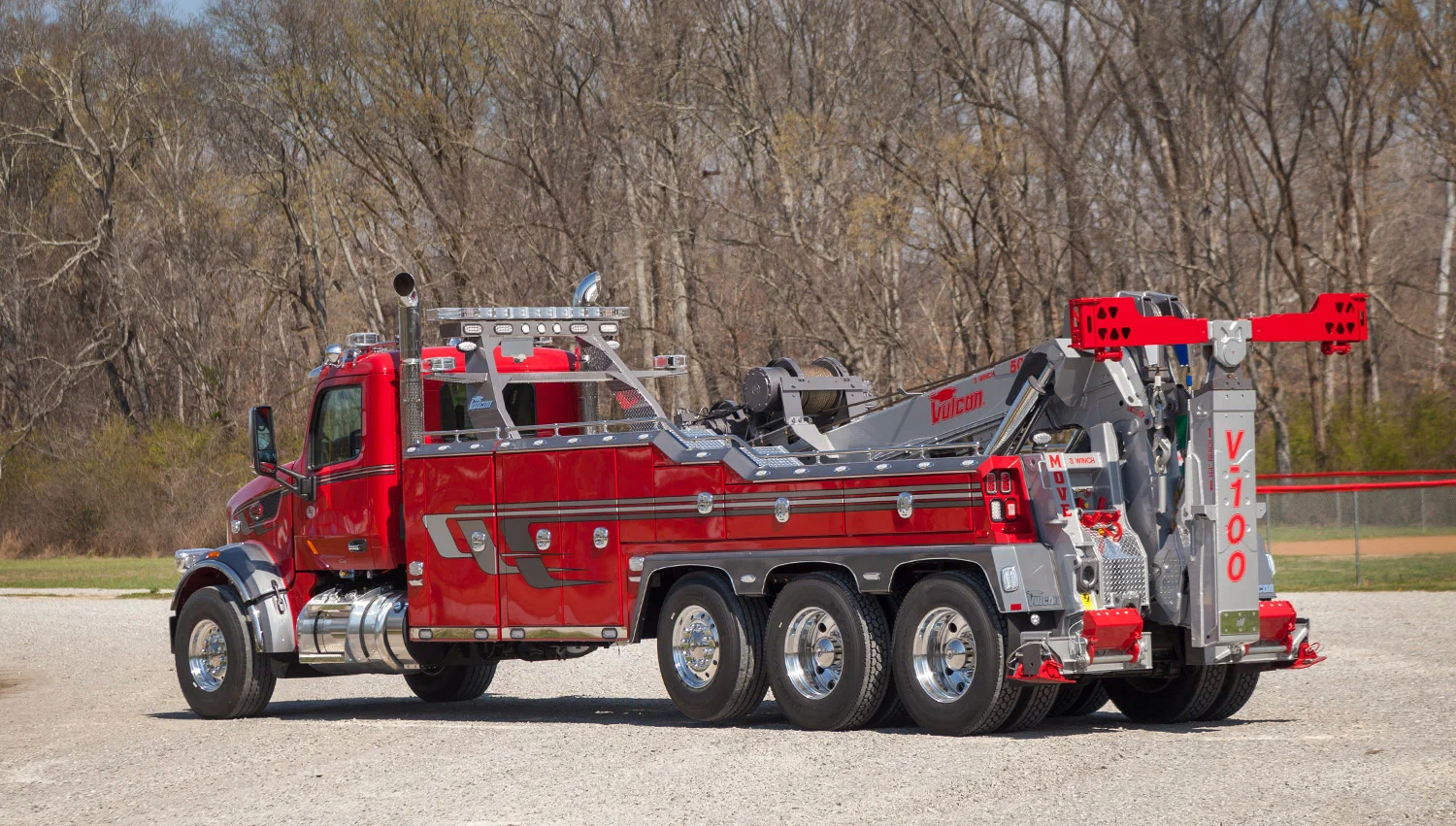 heavy-duty-tow-truck-scene Red heavy duty tow truck on gravel lot
